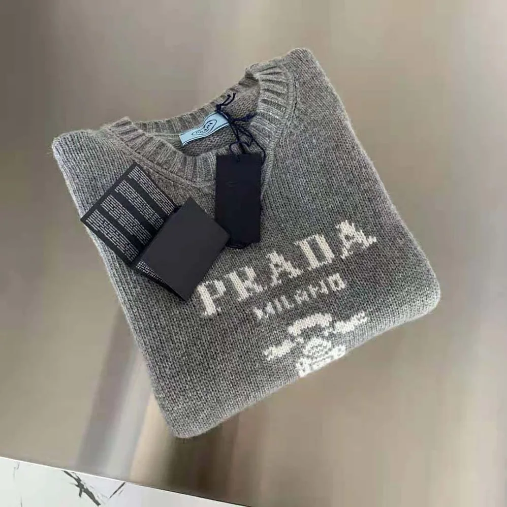 Prada Cashmere and Wool Prada Logo Crew-Neck Sweater for Women in Silver Prada Cashmere and Wool Prada Logo Crew-Neck Sweater for Women in Silver