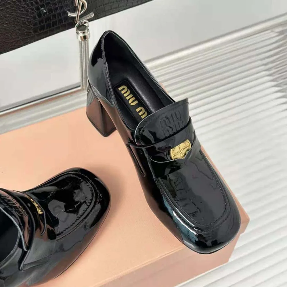 Miu Miu Patent Leather Loafers with Embossed Logo on the Tongue for Women in Black Miu Miu Patent Leather Loafers with Embossed Logo on the Tongue for Women in Black
