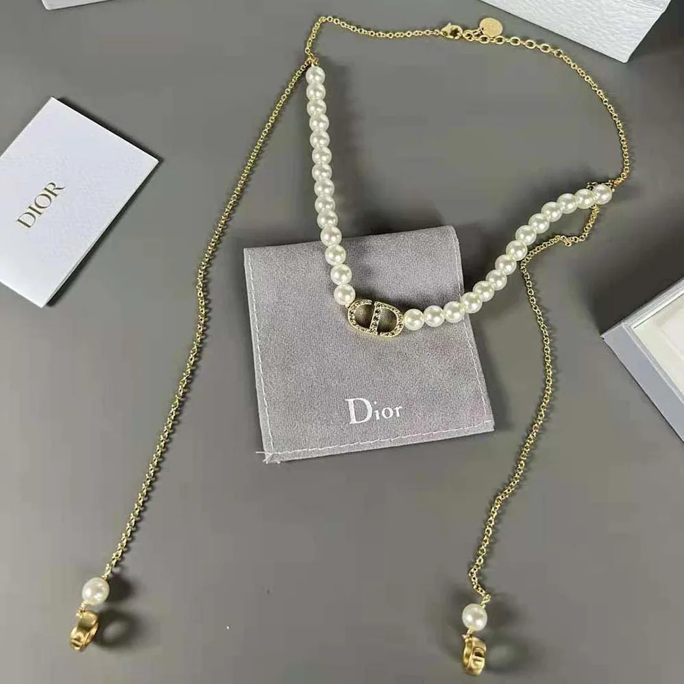 Dior Petit CD Necklace for Headphones Gold for Women in Finish Metal Dior Petit CD Necklace for Headphones Gold for Women in Finish Metal