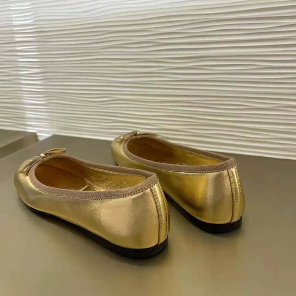 Prada Nappa Leather Ballerinas for Women in Gold Prada Nappa Leather Ballerinas for Women in Gold