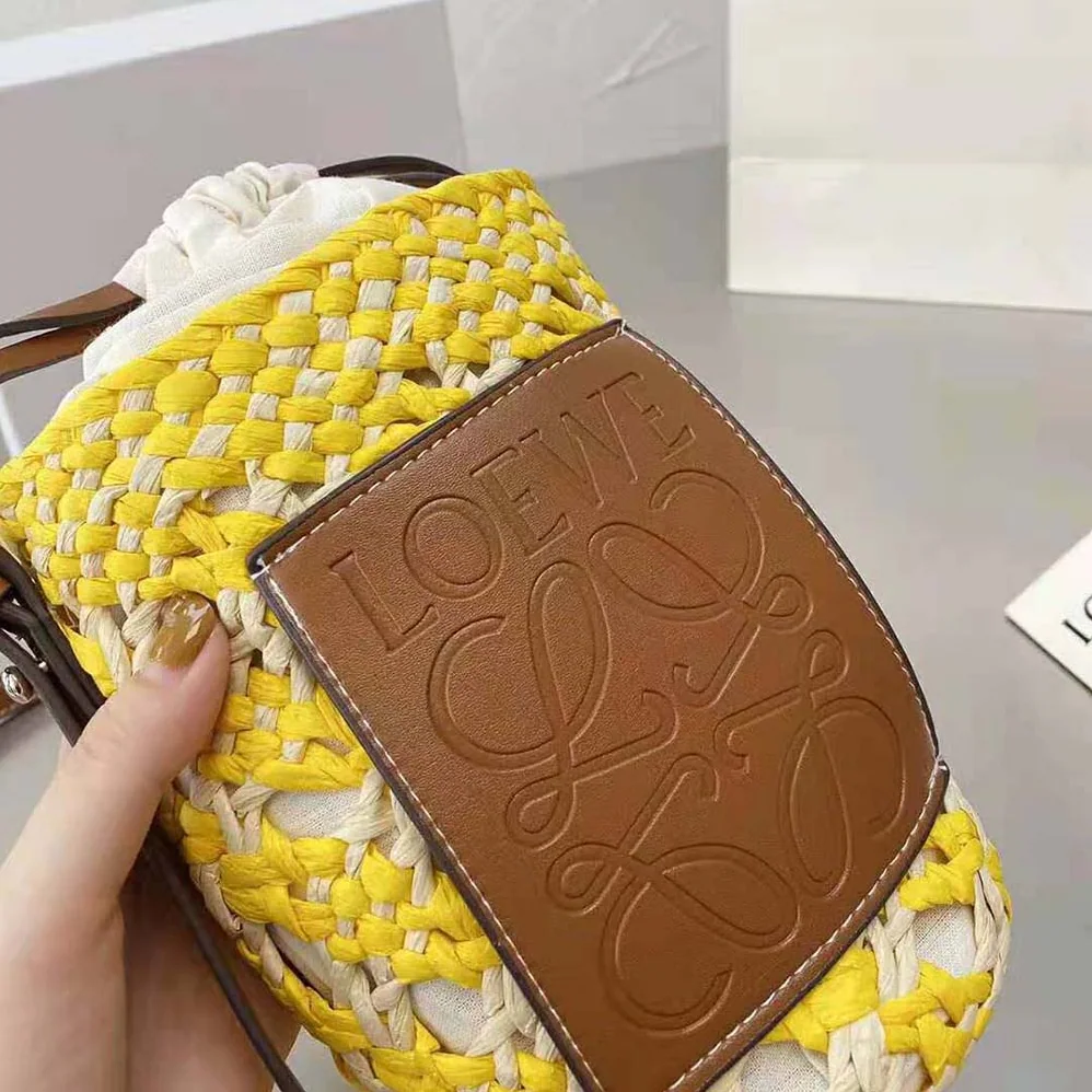 Loewe Cylinder Pocket in Iraca Palm and Calfskin for Women Loewe Cylinder Pocket in Iraca Palm and Calfskin for Women