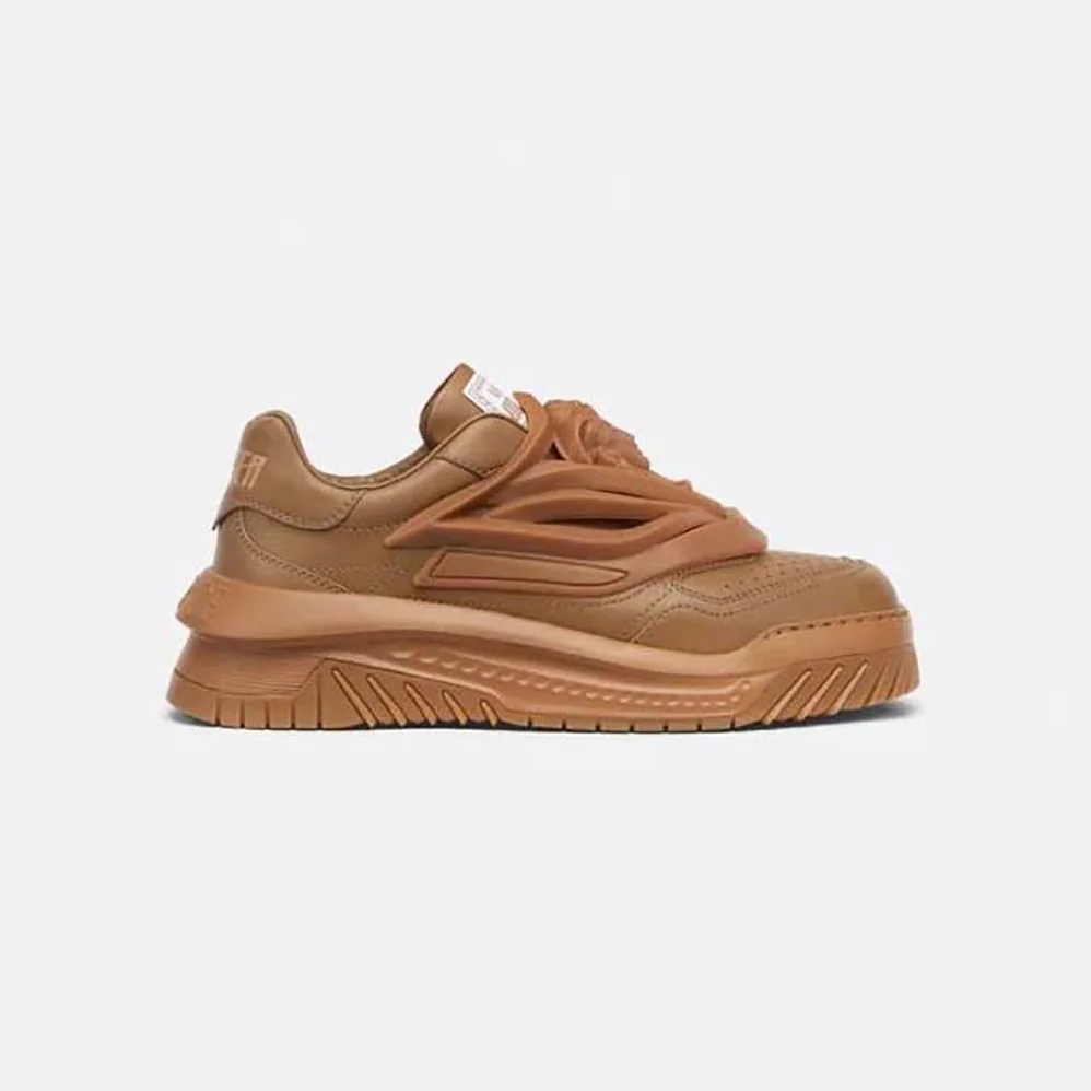 Versace Odissea Sneakers are Set on Rubber Soles with Perforated Toe Caps for Unisex in Brown Versace Odissea Sneakers are Set on Rubber Soles with Perforated Toe Caps for Unisex in Brown