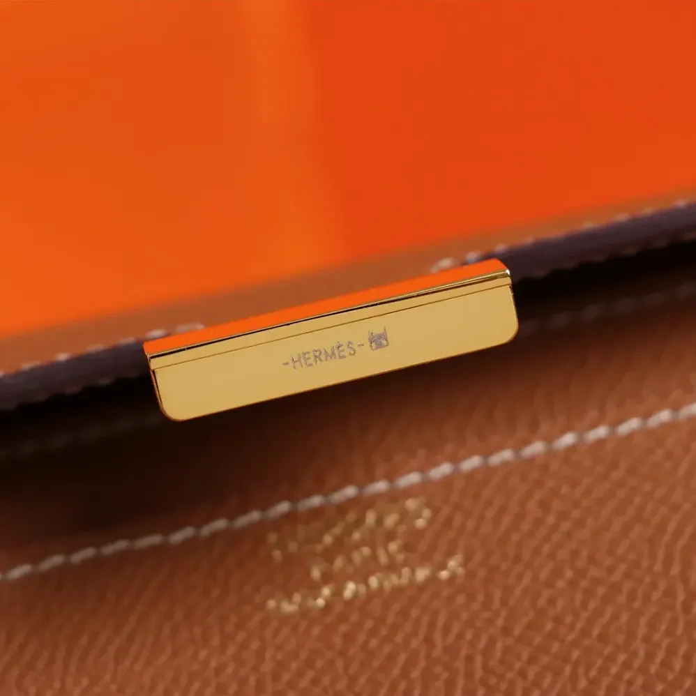 Hermes Constance Long To Go in Epsom Leather for Women in Brown/Gold