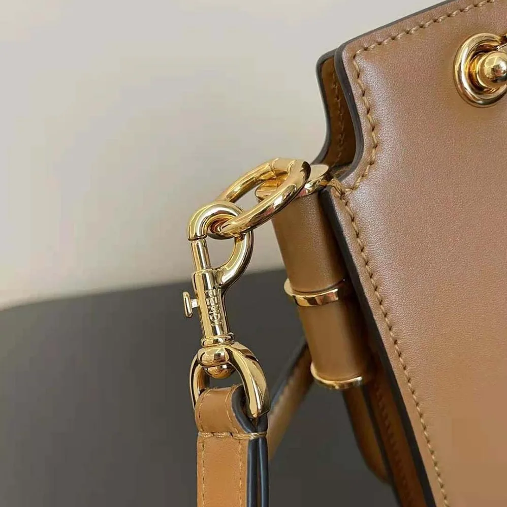 Fendi Touch Leather Bag with A Metal FF Clasp for Women in Brown
