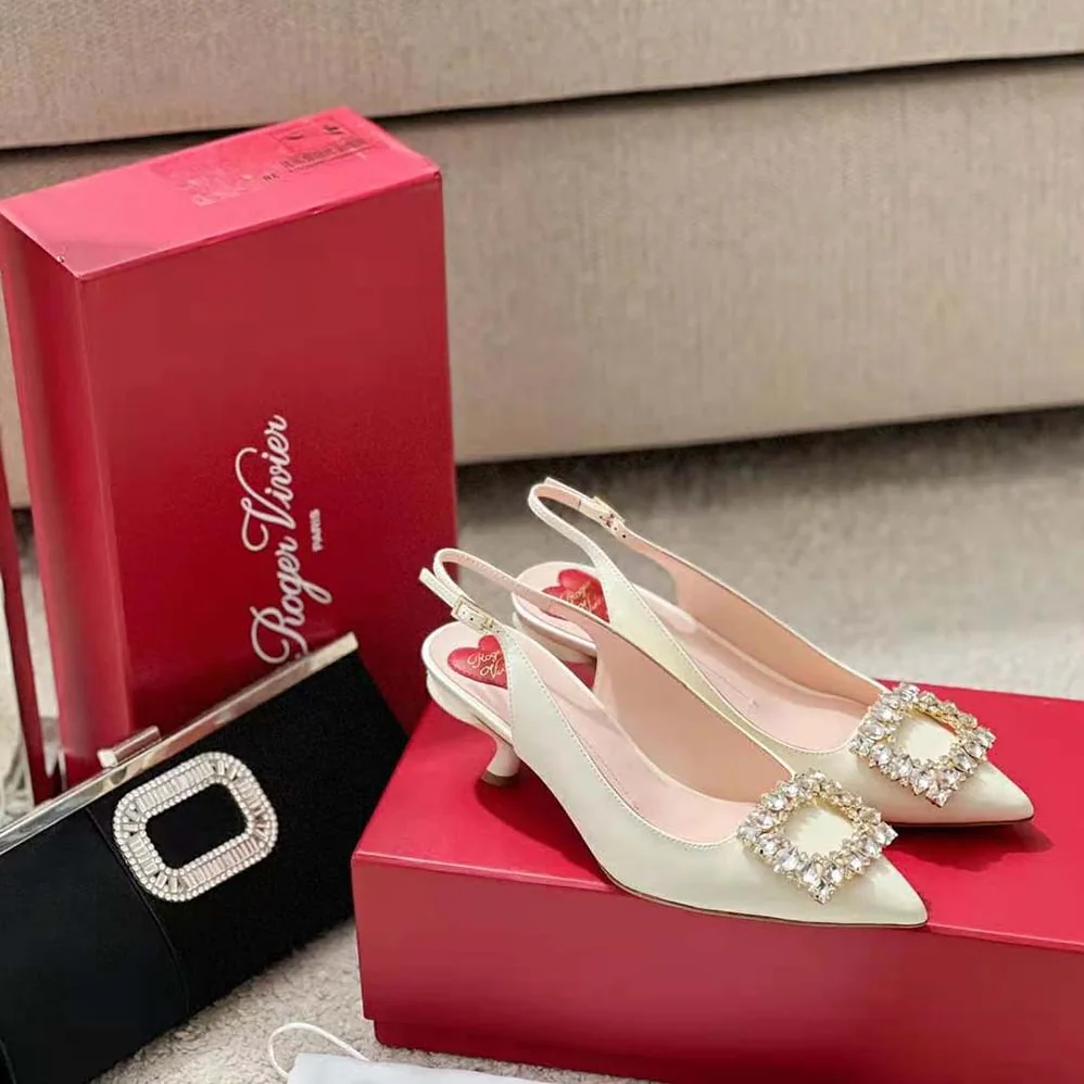 Roger Vivier Virgule Strass Buckle Slingback Pumps in Patent Leather for Women in White Roger Vivier Virgule Strass Buckle Slingback Pumps in Patent Leather for Women in White