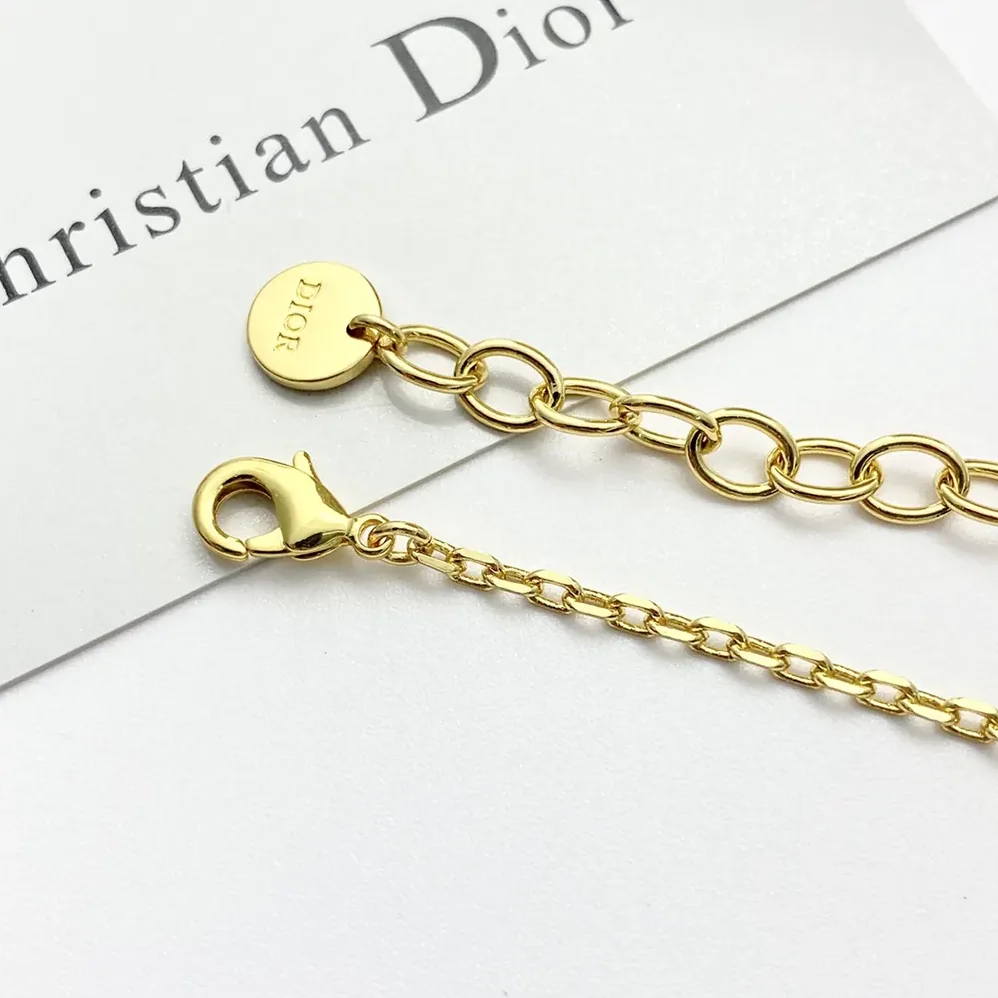 Dior Petit CD Bracelet Gold-Finish Metal with a White Resin Pearl and Silver for Women in Tone Crystals Dior Petit CD Bracelet Gold-Finish Metal with a White Resin Pearl and Silver for Women in Tone Crystals