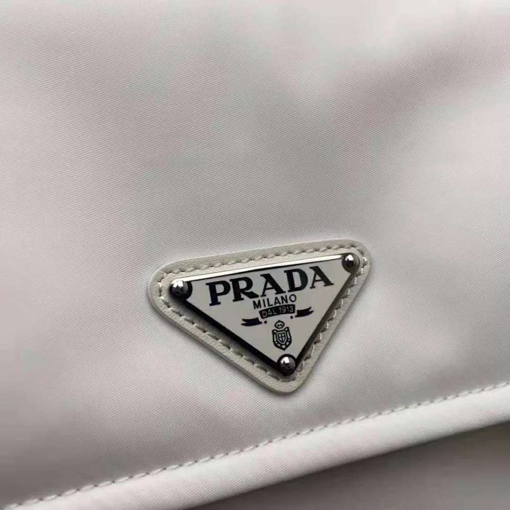 Prada Small Padded Re-Nylon Shoulder Bag for Women in White Prada Small Padded Re-Nylon Shoulder Bag for Women in White