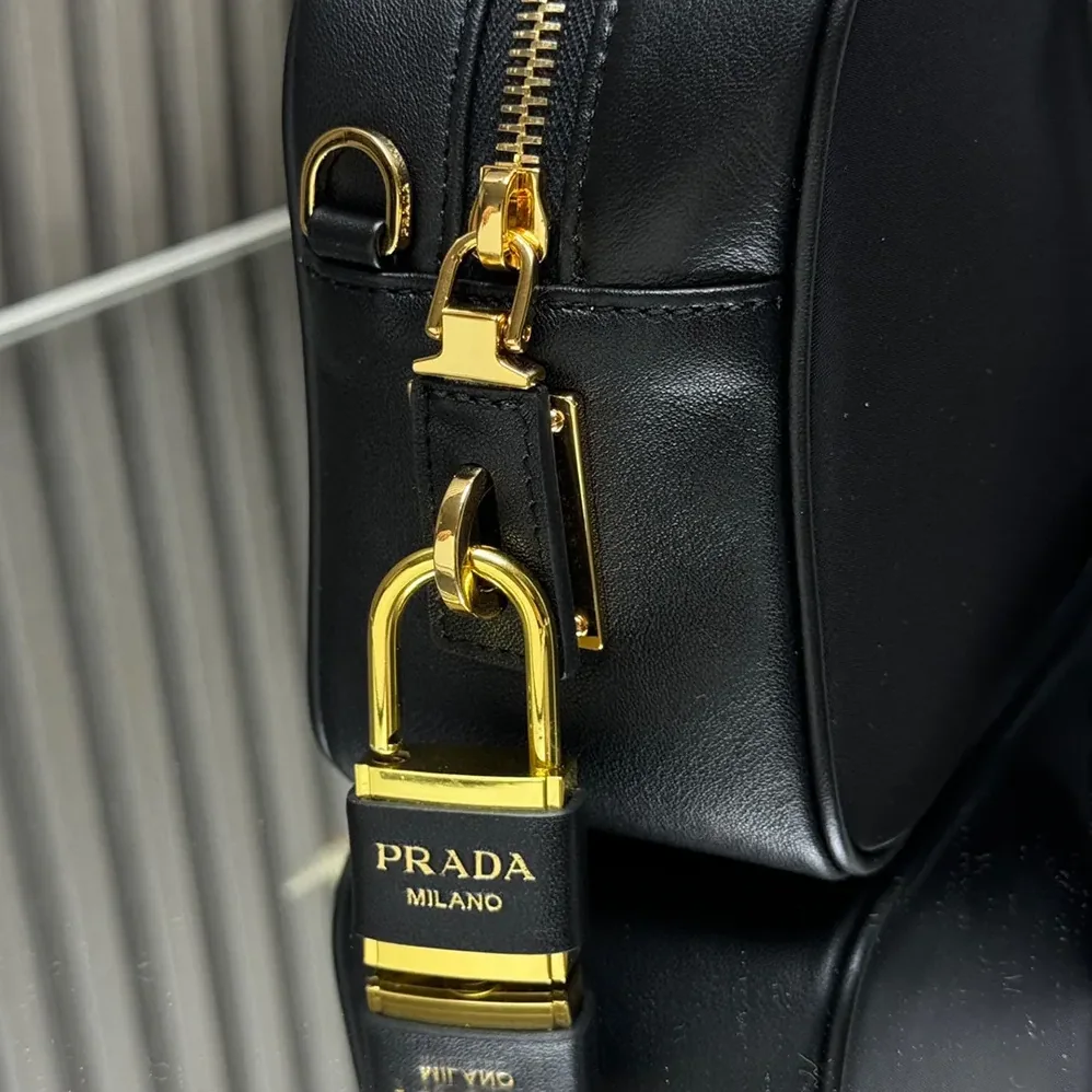 Prada Re-Nylon and Leather Small Top for Women in handle Bag with Padlock Prada Re-Nylon and Leather Small Top for Women in handle Bag with Padlock