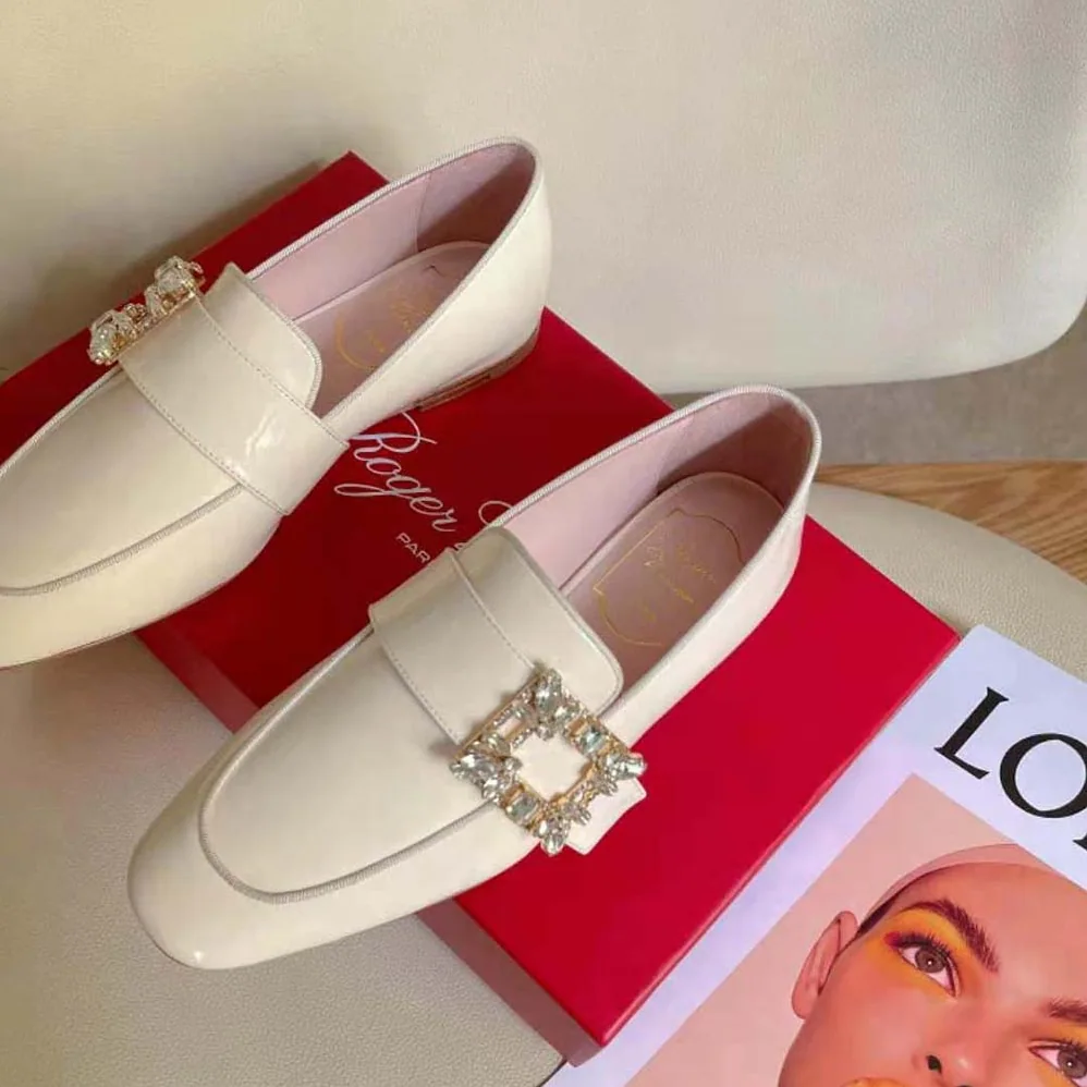 Roger Vivier Mini Broche Vivier Buckle Loafers in Patent Leather for Women in White Roger Vivier Mini Broche Vivier Buckle Loafers in Patent Leather for Women in White