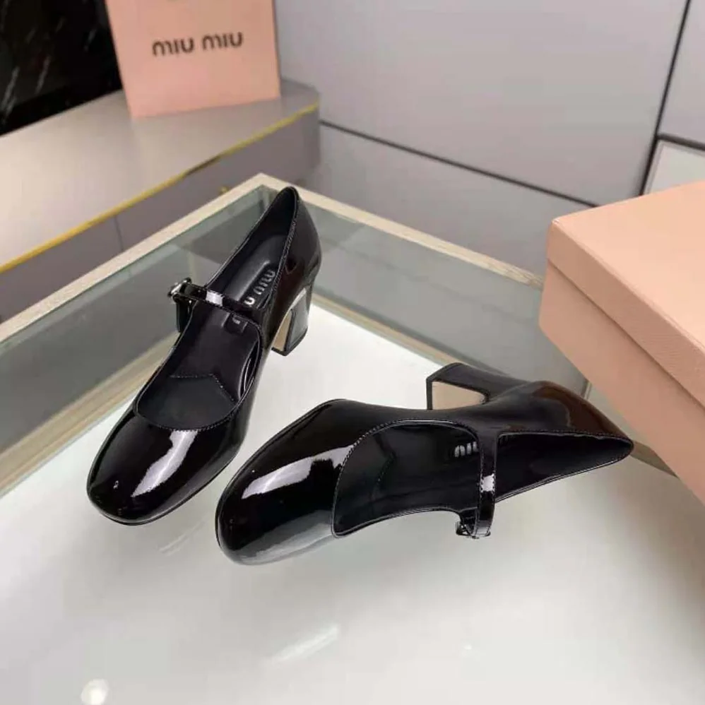 Miu Miu Patent Leather Pumps with Metal Lettering Logo for Women in Black Miu Miu Patent Leather Pumps with Metal Lettering Logo for Women in Black