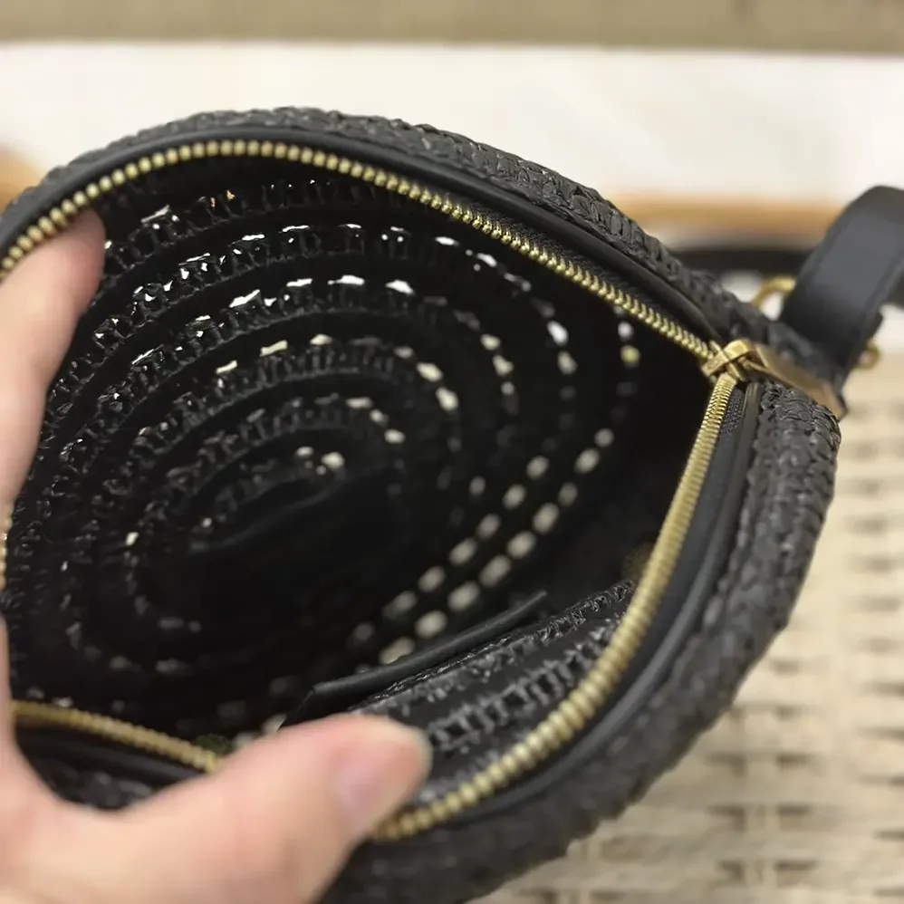 Saint Laurent YSL Round Bag in Raffia and Vegetable-Tanned Leather for Women in Black Saint Laurent YSL Round Bag in Raffia and Vegetable-Tanned Leather for Women in Black