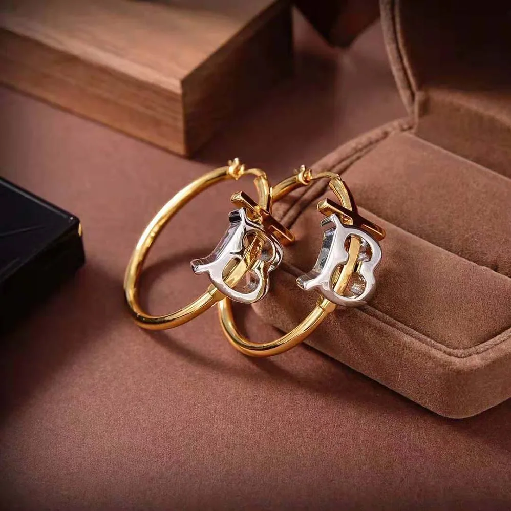 Burberry Gold and Palladium for Women in plated Monogram Motif Earrings Burberry Gold and Palladium for Women in plated Monogram Motif Earrings