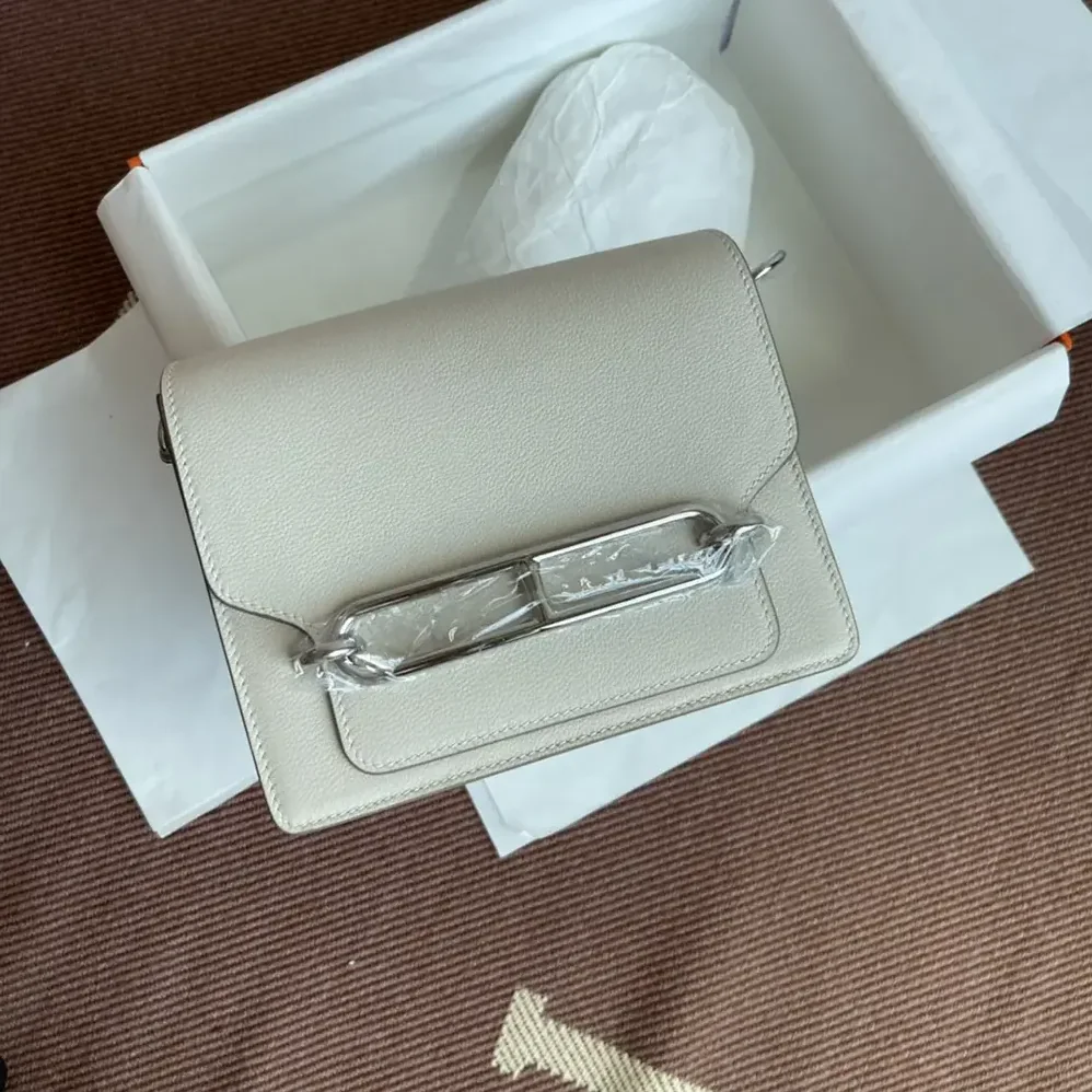 Hermes Roulis Mini Bag in Evercolor Calfskin for Women in White/Silver Hermes Roulis Mini Bag in Evercolor Calfskin for Women in White/Silver