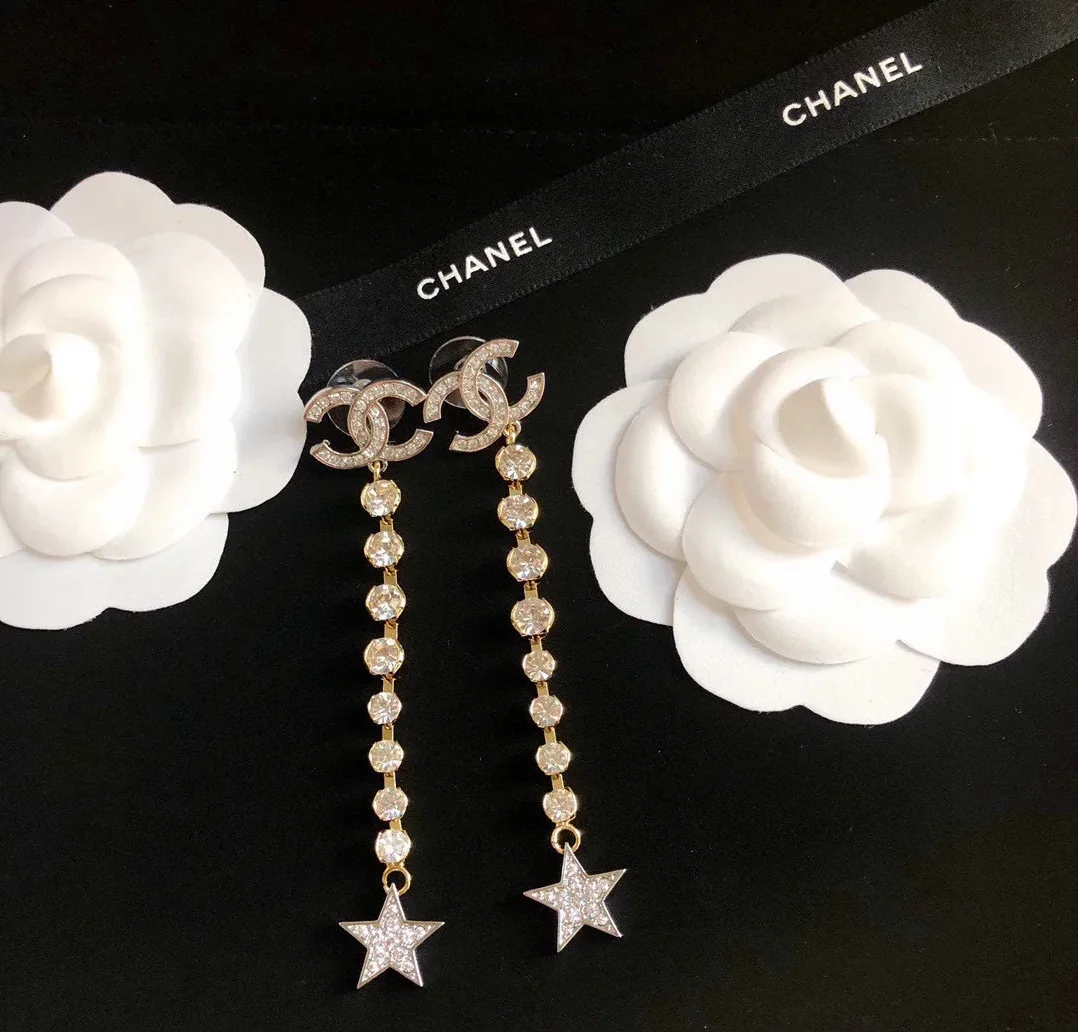 Chanel Long Star Earrings Gold Chanel Long Star Earrings Gold