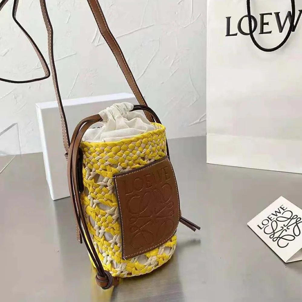 Loewe Cylinder Pocket in Iraca Palm and Calfskin for Women Loewe Cylinder Pocket in Iraca Palm and Calfskin for Women
