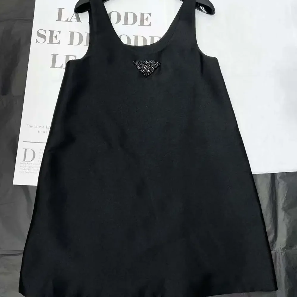 Prada Re-Nylon Mini-dress with Black Metal Triangle Logo for Women Prada Re-Nylon Mini-dress with Black Metal Triangle Logo for Women