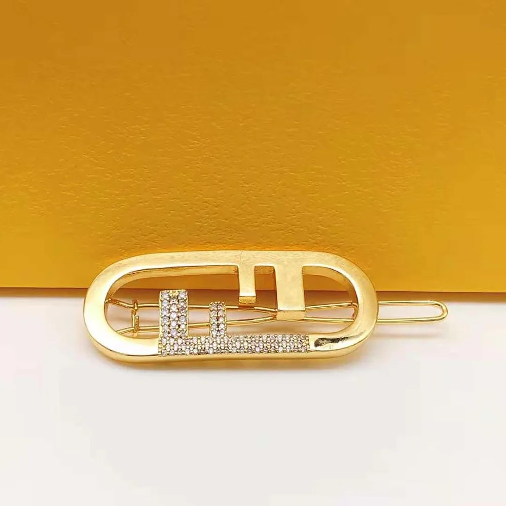 Fendi O'Lock Hair Clip Gold for Women in Coloured Fendi O'Lock Hair Clip Gold for Women in Coloured