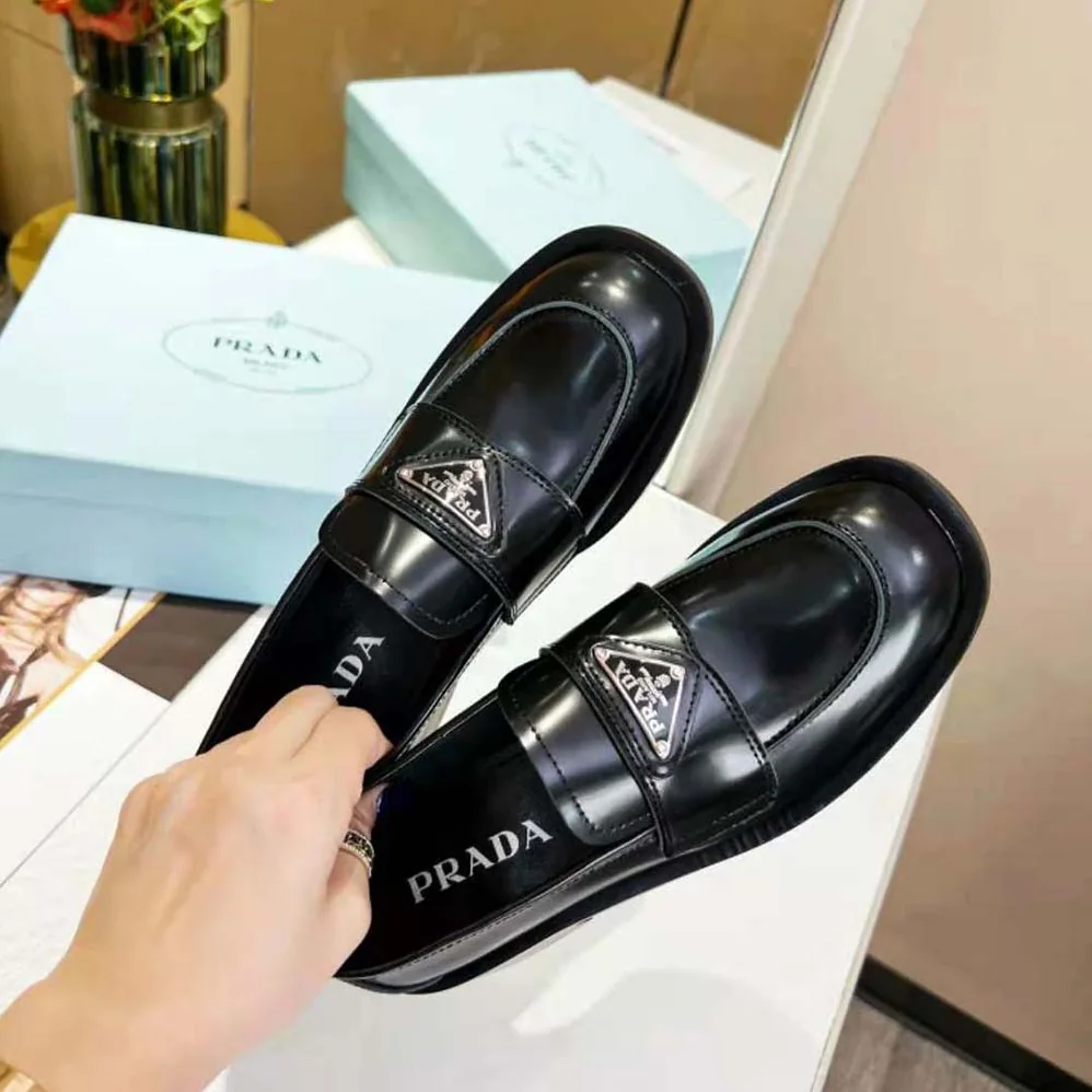 Prada Brushed Leather Loafers for Women in Black