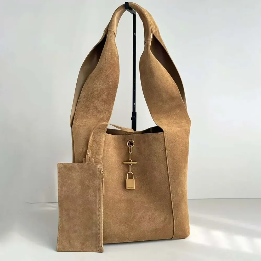 Saint Laurent YSL Hobo Tanger Logo Engraved Shoulder Bag for Women Saint Laurent YSL Hobo Tanger Logo Engraved Shoulder Bag for Women