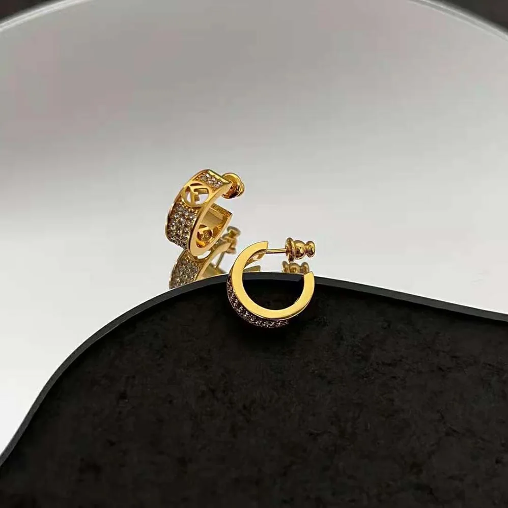 Fendi Small Hoop Earrings with F is Fendi Motif Gold for Women in coloured Fendi Small Hoop Earrings with F is Fendi Motif Gold for Women in coloured