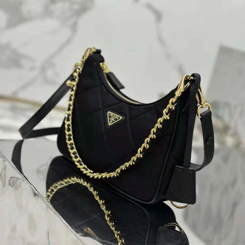Prada Re-Edition 1995 Chaîne Re-Nylon Mini-bag for Women in Black Prada Re-Edition 1995 Chaîne Re-Nylon Mini-bag for Women in Black