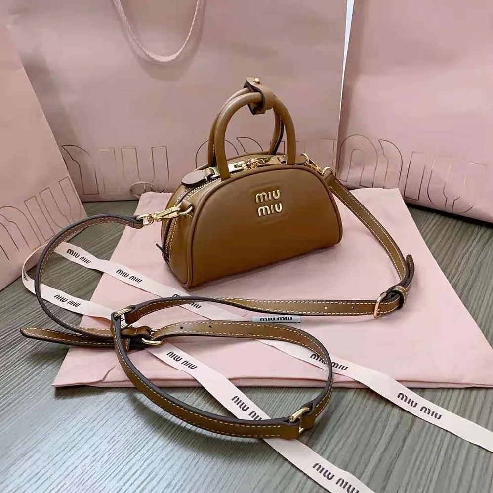 Miu Miu Mini Leather Top-handle Bag for Women in Brown