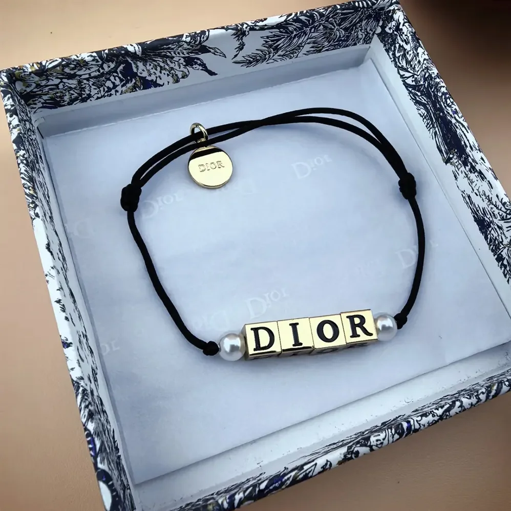 Dior D-Dice Bracelet Black Cotton and Lacquer with Gold-Finish Metal and White Resin Pearls for Women Dior D-Dice Bracelet Black Cotton and Lacquer with Gold-Finish Metal and White Resin Pearls for Women