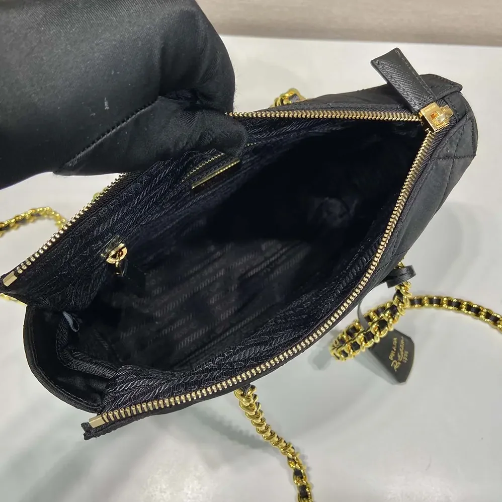 Prada Re-Edition 1995 Chaîne Re-Nylon Tote Bag for Women in Black Prada Re-Edition 1995 Chaîne Re-Nylon Tote Bag for Women in Black