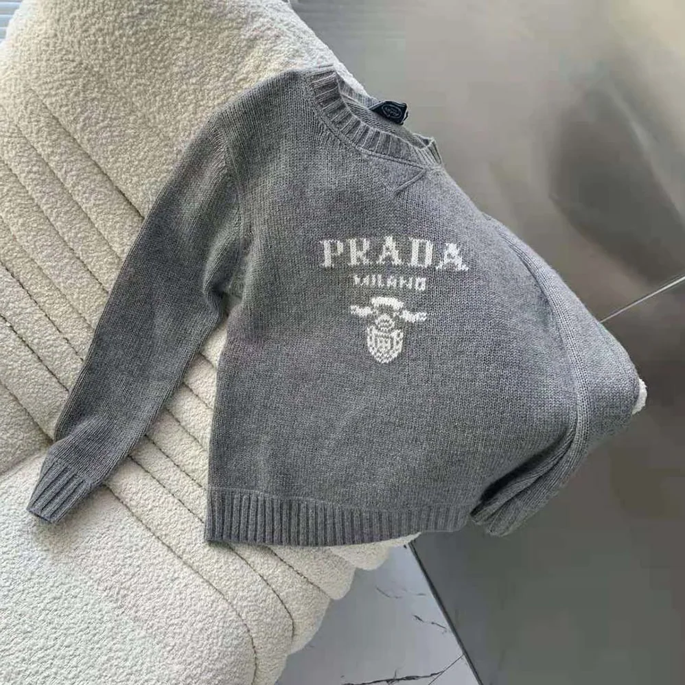 Prada Cashmere and Wool Prada Logo Crew-Neck Sweater for Women in Silver Prada Cashmere and Wool Prada Logo Crew-Neck Sweater for Women in Silver