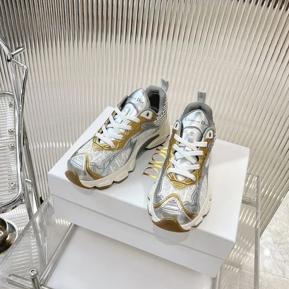 Dior Vibe Sneaker White Mesh Printed with Dior Oblique Motif and Gold- and Silver in Tone Dior Vibe Sneaker White Mesh Printed with Dior Oblique Motif and Gold- and Silver in Tone