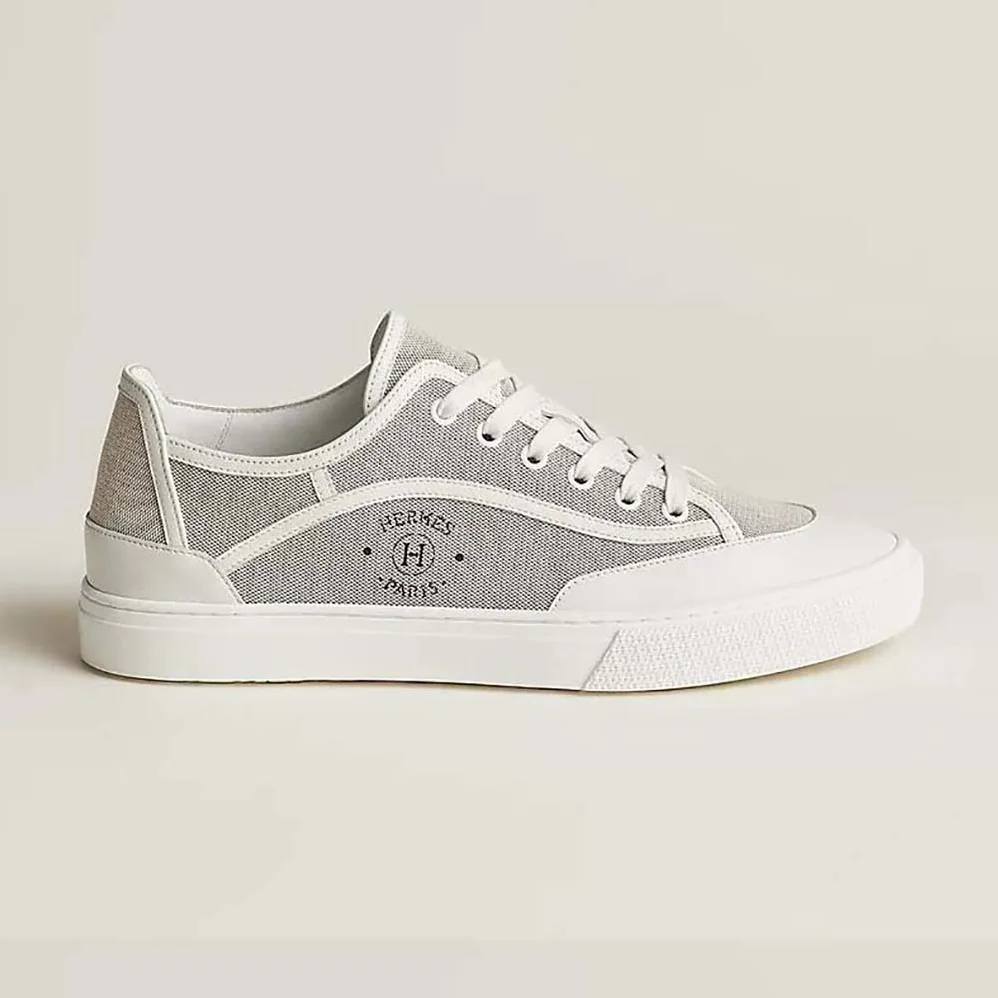 Hermes Get Sneaker in SH Canvas and Calfskin with Signature “Hermès Paris” Stencil for Unisex in Silver Hermes Get Sneaker in SH Canvas and Calfskin with Signature “Hermès Paris” Stencil for Unisex in Silver