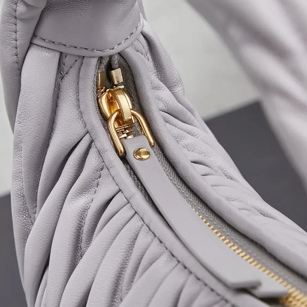 Miu Miu Wander Matelassé Nappa Leather Hobo Bag for Women in Wisteria Miu Miu Wander Matelassé Nappa Leather Hobo Bag for Women in Wisteria