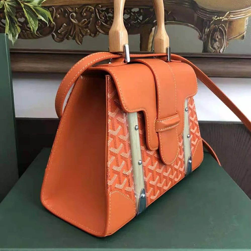 Goyard Sac Saïgon PM in Toile Goyardine & Clamecy Calfskin for Women in Orange Goyard Sac Saïgon PM in Toile Goyardine & Clamecy Calfskin for Women in Orange