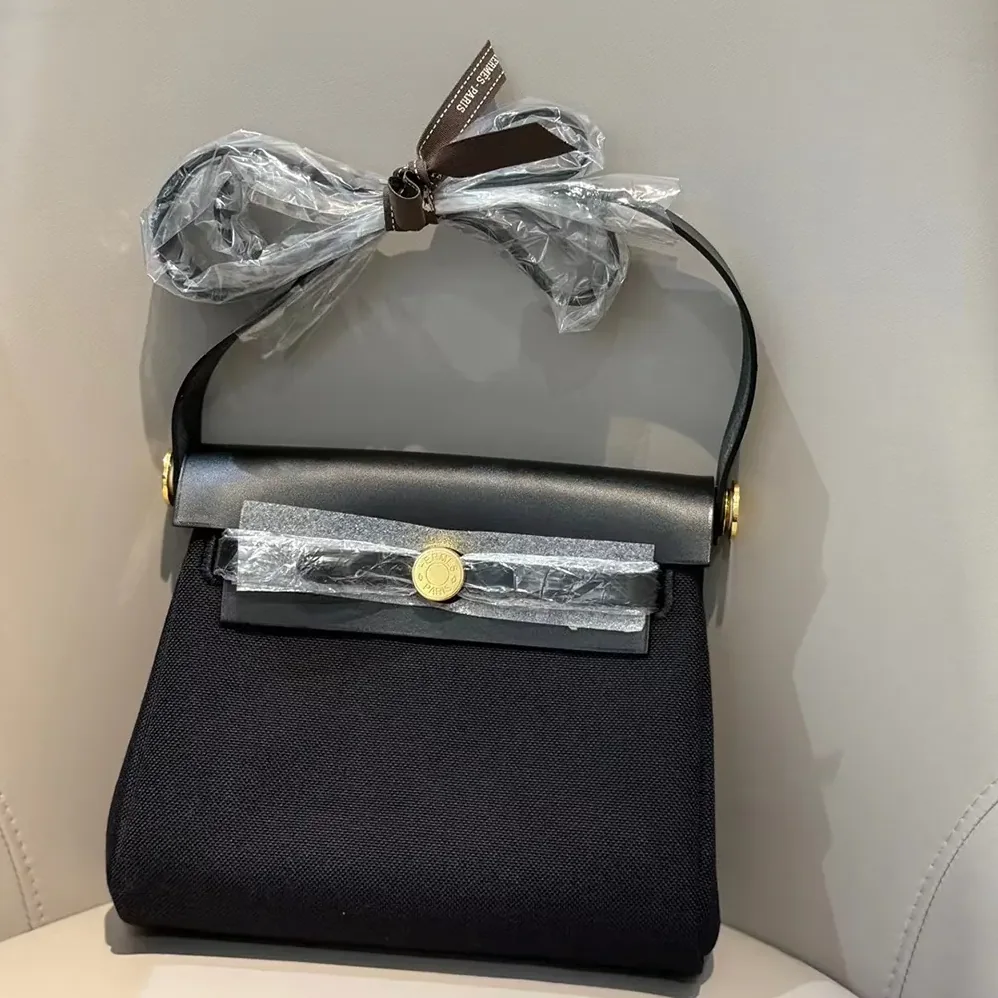 Hermes Herbag Zip 20 Bag for Women in Black/Gold Hermes Herbag Zip 20 Bag for Women in Black/Gold