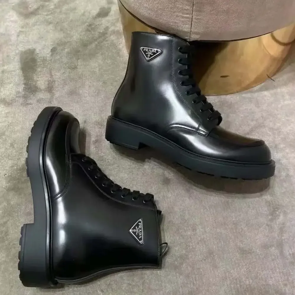 Prada Brushed Leather Combat Boots for Unisex in Black