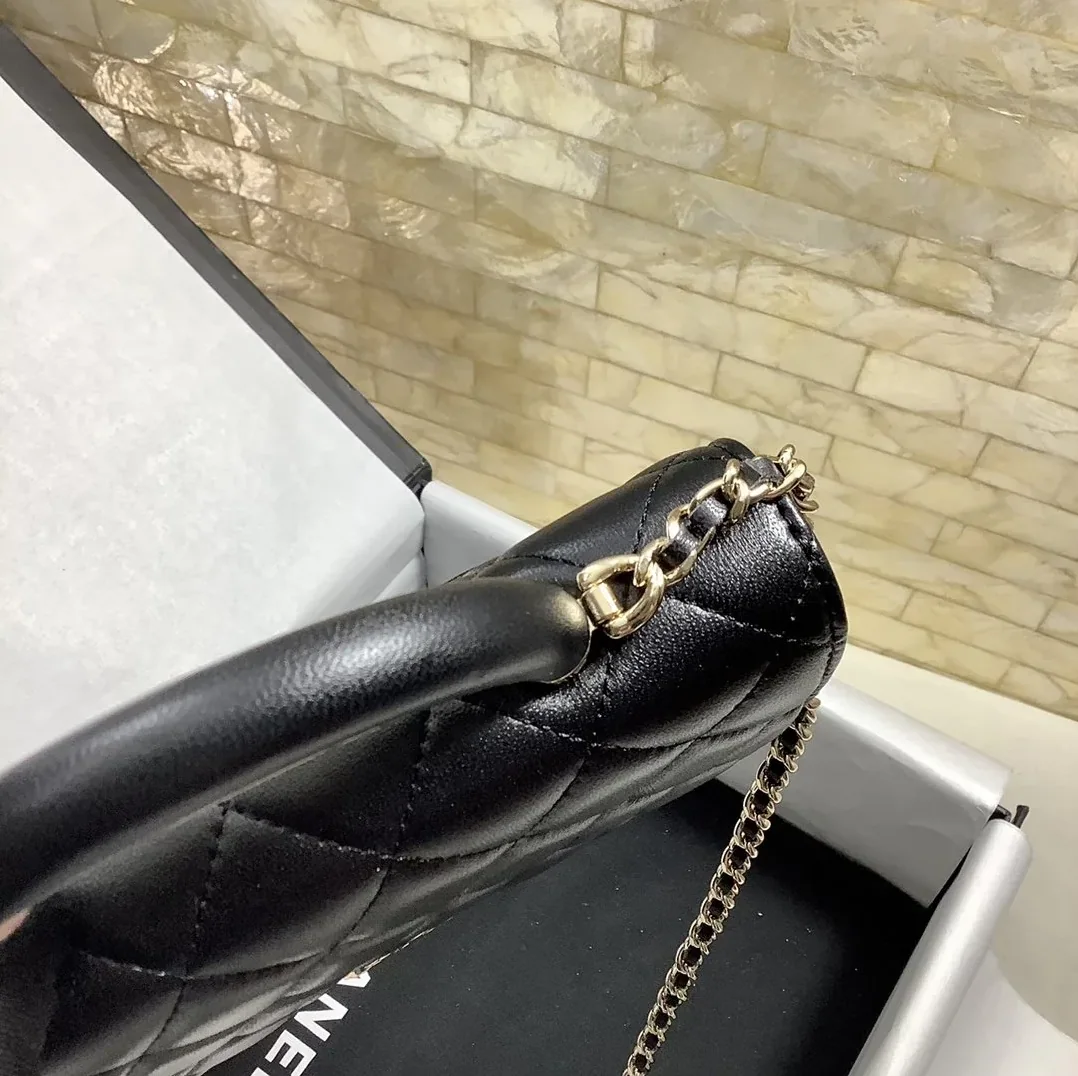 Chanel Hand-Held Oblique Cross Bag Black