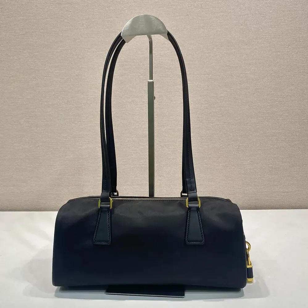 Prada Re-Nylon and Leather Medium Top-handle Bag with Padlock for Women in Black Prada Re-Nylon and Leather Medium Top-handle Bag with Padlock for Women in Black