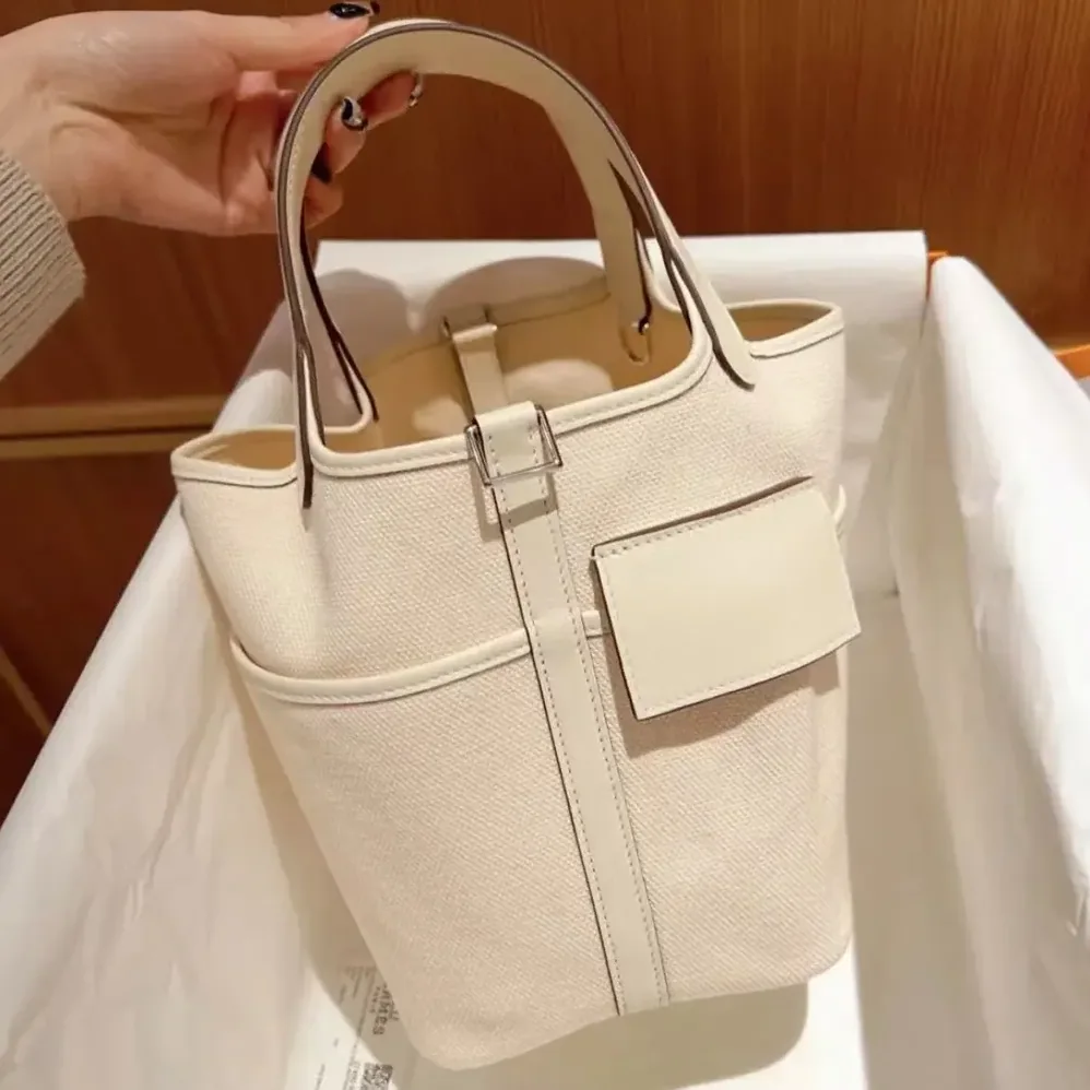 Hermes Picotin Lock 18 Pockets in Goeran Canvas Leather for Women in White Hermes Picotin Lock 18 Pockets in Goeran Canvas Leather for Women in White