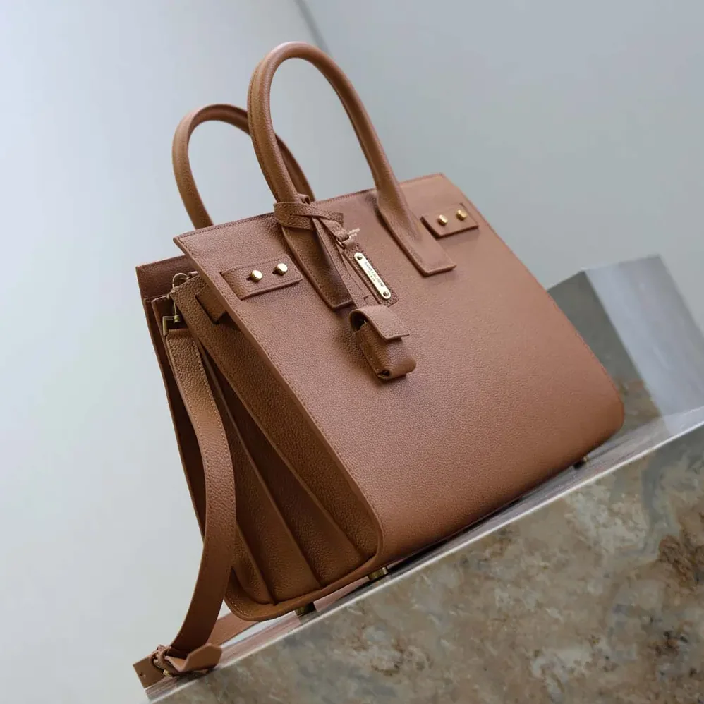 Saint Laurent YSL Baby Sac De Jour In Supple Grained Leather for Women in Brown Saint Laurent YSL Baby Sac De Jour In Supple Grained Leather for Women in Brown
