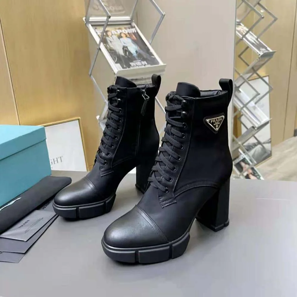 Prada Brushed Leather and Nylon Booties for Women in Black Prada Brushed Leather and Nylon Booties for Women in Black
