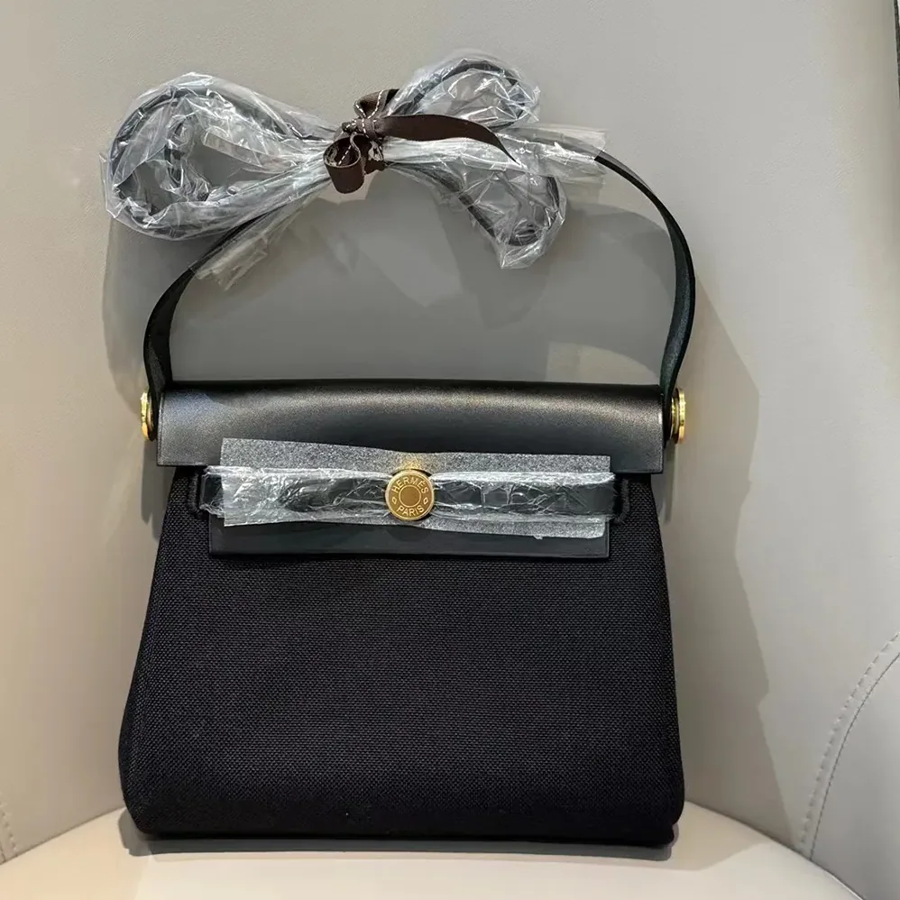 Hermes Herbag Zip 20 Bag for Women in Black/Gold Hermes Herbag Zip 20 Bag for Women in Black/Gold