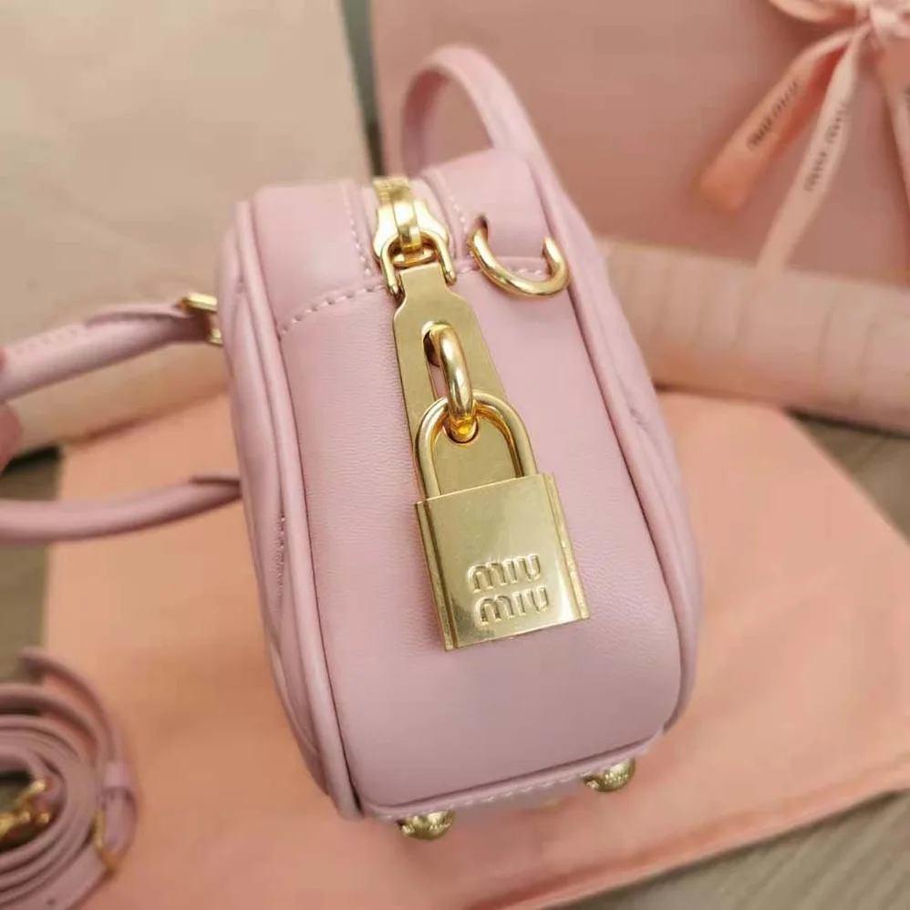 Miu Miu Matelassé Nappa Leather Top-Handle Bag for Women in Pink Miu Miu Matelassé Nappa Leather Top-Handle Bag for Women in Pink