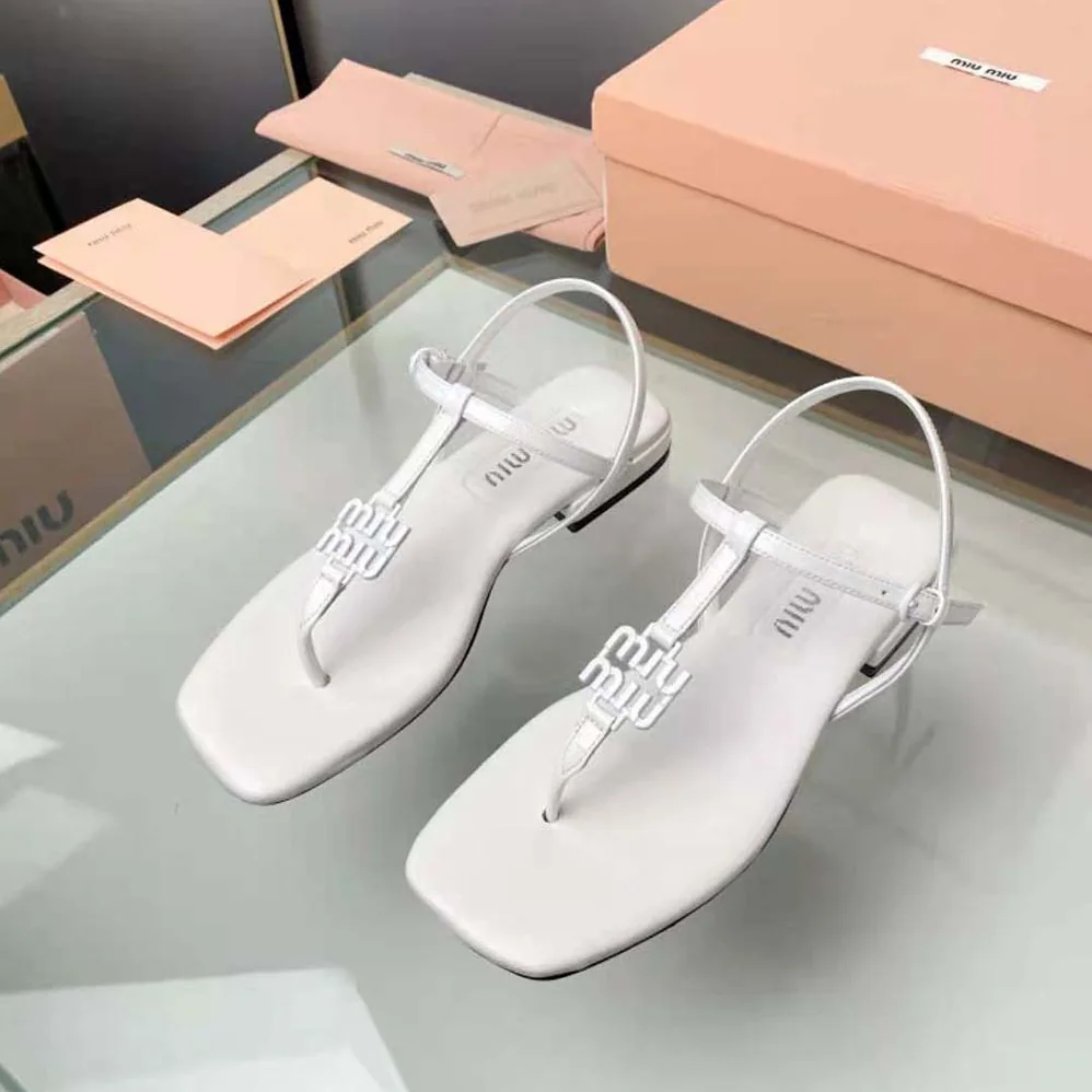 Miu Miu Patent Thong Sandals with Metal Lettering Logo for Women in White Miu Miu Patent Thong Sandals with Metal Lettering Logo for Women in White