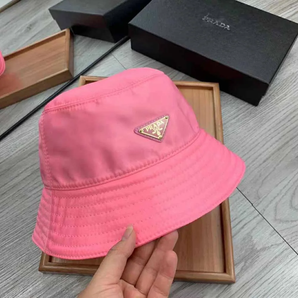 Prada Nylon Bucket Hat Decorated with the Triangle Logo for Women in Pink Prada Nylon Bucket Hat Decorated with the Triangle Logo for Women in Pink