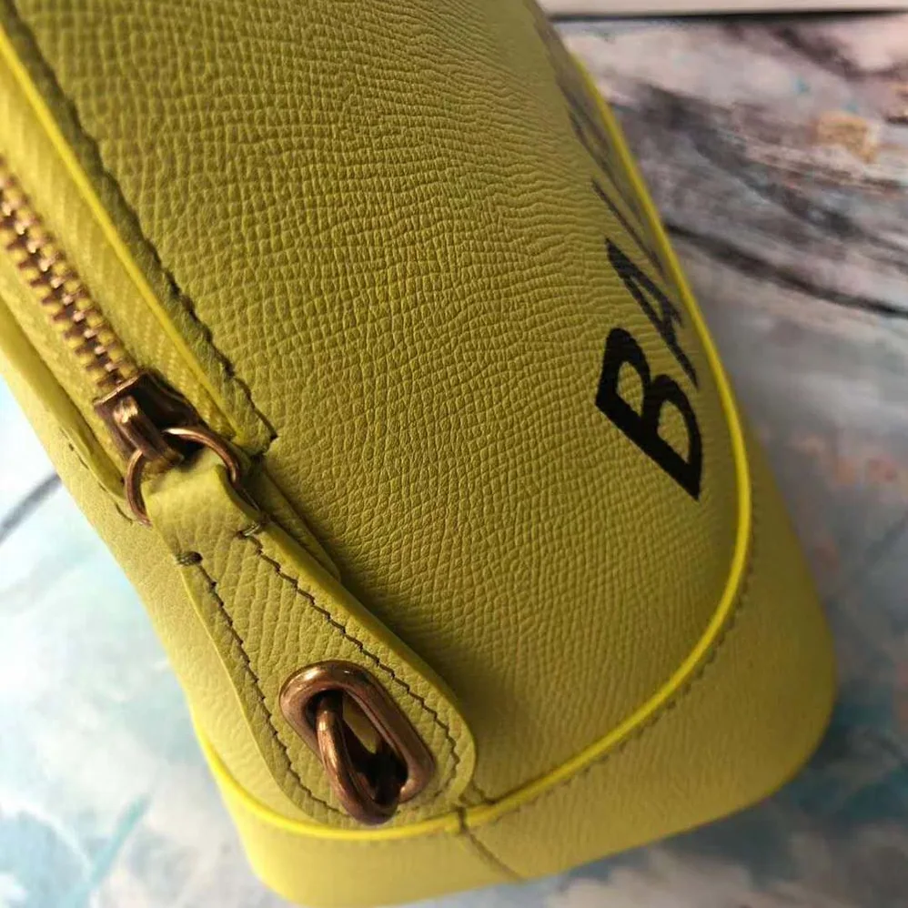 Balenciaga Ville Top Handle XXS Small Graffiti Calfskin for Women in Yellow