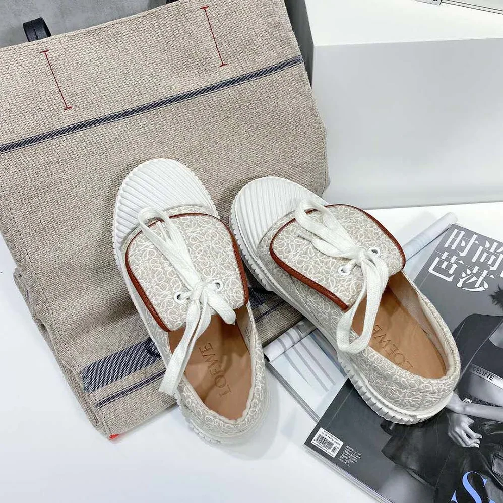 Loewe Anagram Flap Sneaker in Canvas for Women in White Loewe Anagram Flap Sneaker in Canvas for Women in White