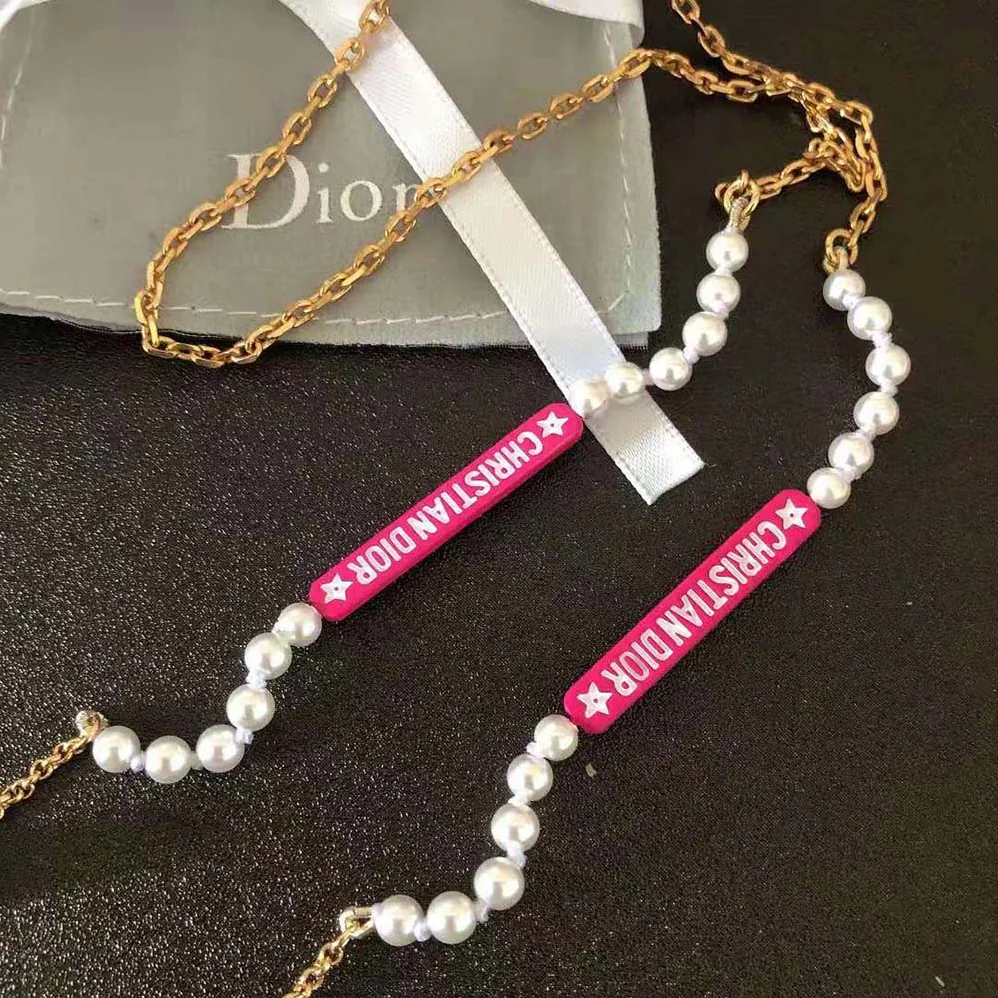 Dior D-Vibe Necklace for Headphones Gold-Finish Metal and White Resin Pearls for Women Dior D-Vibe Necklace for Headphones Gold-Finish Metal and White Resin Pearls for Women