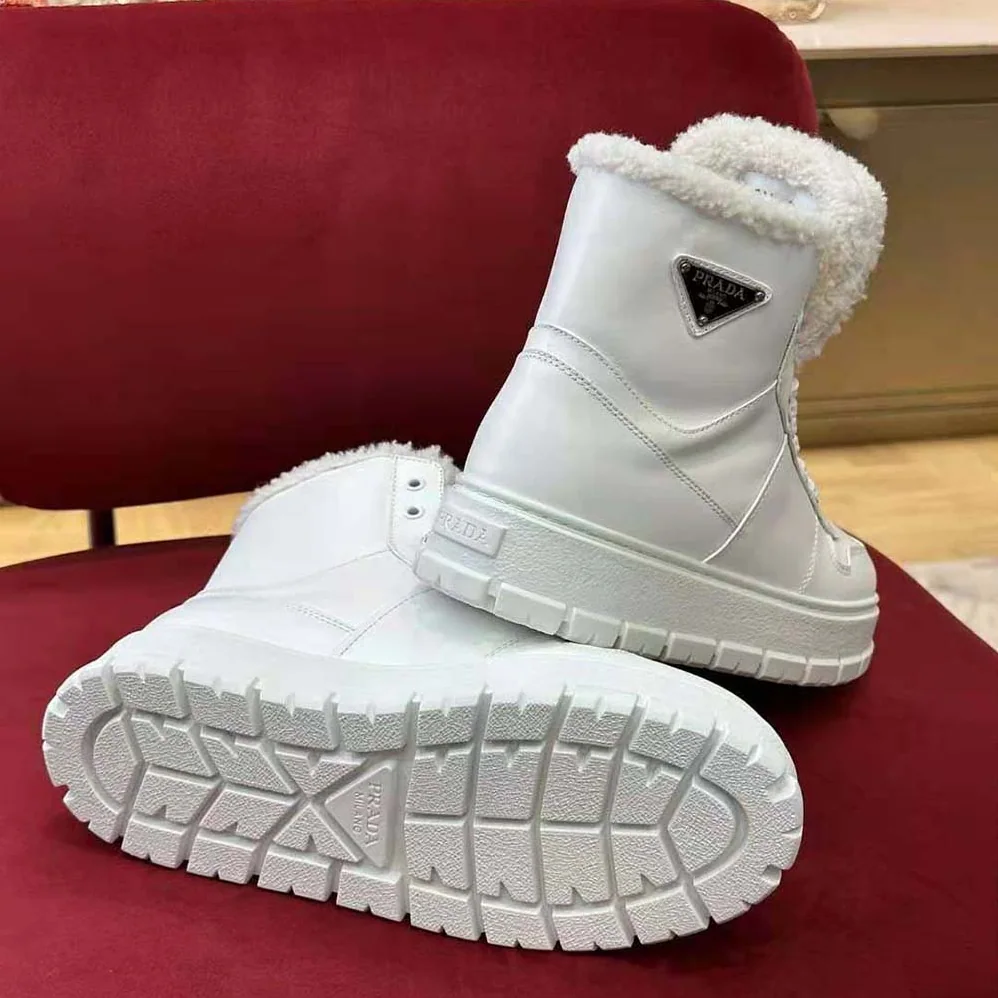 Prada Leather and Shearling High-Top Sneakers for Women in White Prada Leather and Shearling High-Top Sneakers for Women in White