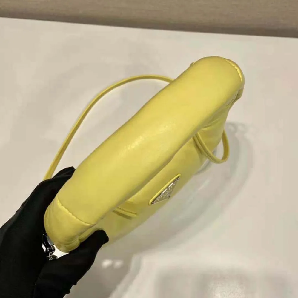 Prada Soft Padded Nappa Leather Mini-Bag for Women in Yellow Prada Soft Padded Nappa Leather Mini-Bag for Women in Yellow