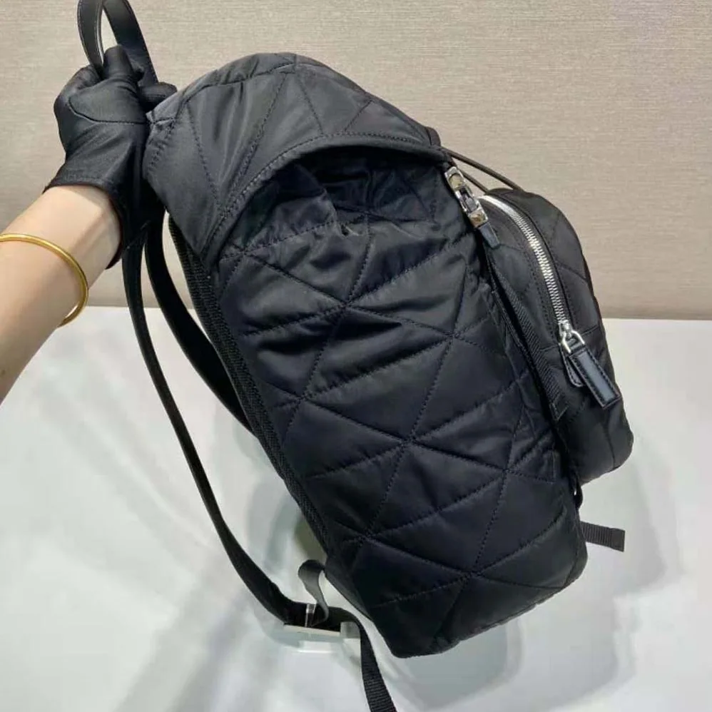 Prada Re-Nylon Backpack with Topstitching for Men in Black Prada Re-Nylon Backpack with Topstitching for Men in Black
